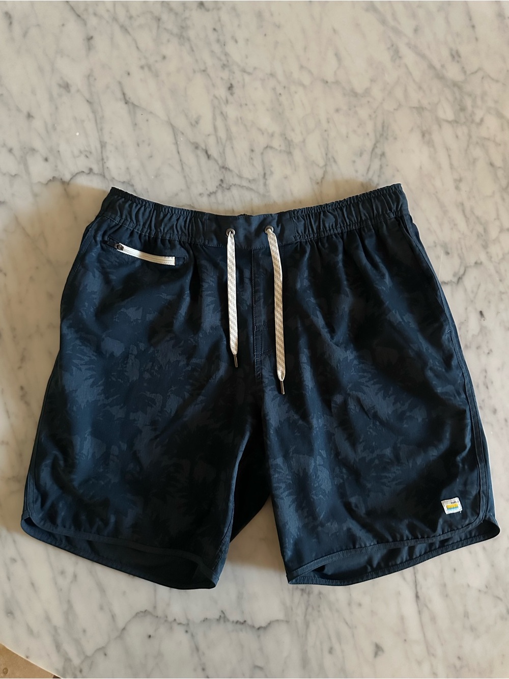 Vuori Men's Banks Shorts in a navy palm tree print